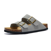 Vienna Sandals in light gray suede with ergonomic sole and sleek adjustable straps, perfect for versatile styling