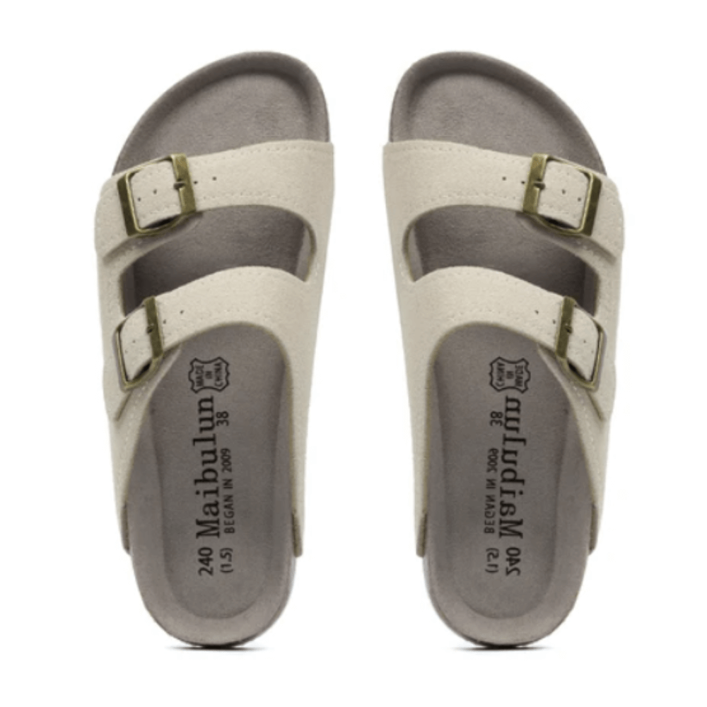 Vienna Sandals in cream suede with a soft texture, ergonomic sole, and adjustable straps for everyday elegance