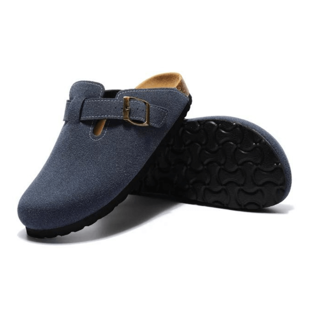 Blue clogs with gold buckle, wide fit design, and ergonomic sole for all-day support and European-inspired style.