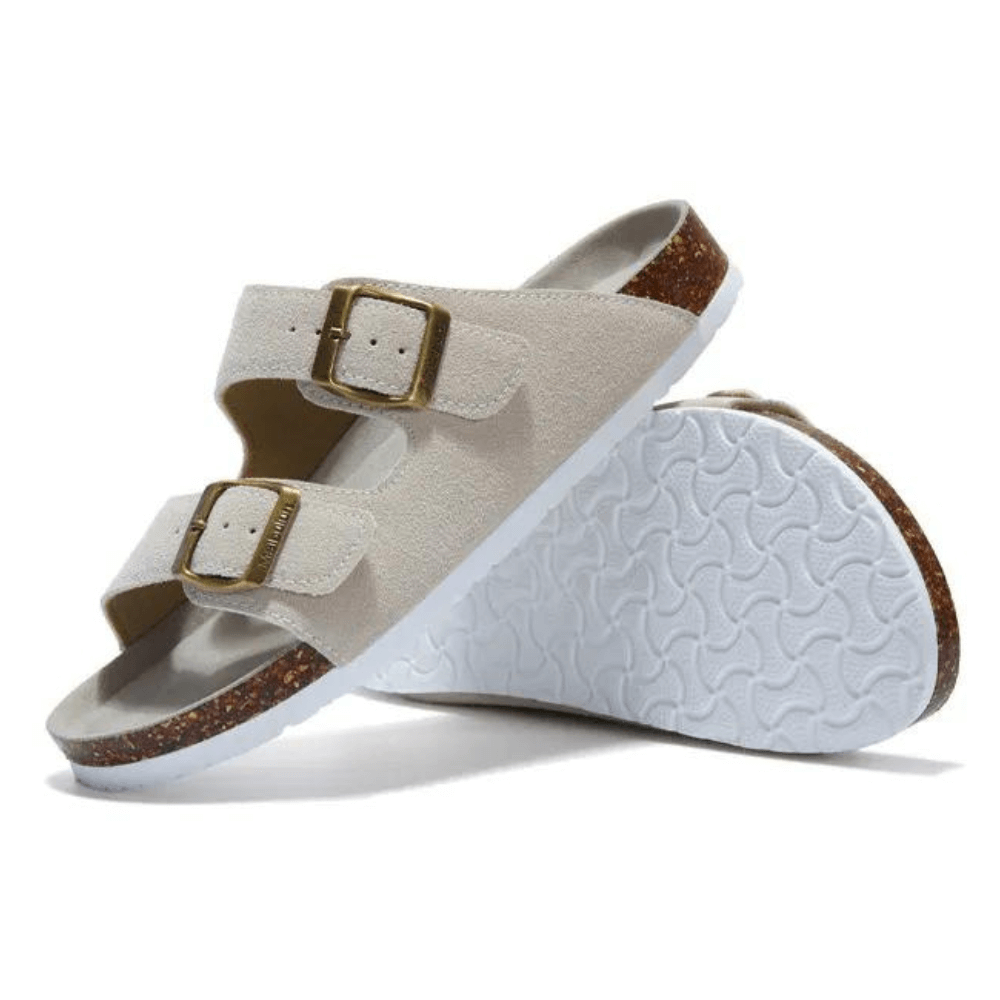 Vienna Sandals in cream suede with a soft texture, ergonomic sole, and adjustable straps for everyday elegance